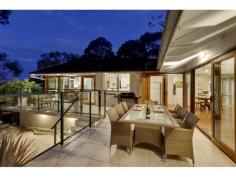 18B Prahran Ave Frenchs Forest NSW 2086 This is a rare 
opportunity to secure a truly stunning and unique family entertainer in 
one of Frenchs Forests most sought after locations. Within short 
walking distance to schools, shops and transport you will be able to 
take advantage of all that Frenchs Forest and Davidson has to offer. Situated
 on a generous 2238m2 block, its impeccably presented 3 bed, 2 bath 
layout takes full advantage of its private tranquil setting with 
uninterrupted tree top views as far as the eye can see. Boasting 
large vaulted ceilings with floor to roof glass, newly renovated gourmet
 kitchen, open plan living areas, wrap around entertaining balcony 
overlooking the resort style pool. This property is one that cant be missed! - Beautifully finished gourmet kitchen with granite bench tops. - Open plan entertaining and dining rooms with uninterrupted views. - Generous 2238m2 block with a sun drenched North East aspect. - Wrap around entertaining balcony overlooking the solar heated resort style pool. - Vaulted ceilings with floor to roof glass. - High quality Blackbutt timber flooring. - Air conditioning throughout. - Gas heating and Bosch instant hot water. - Large double lock up garage with undercover parking for four. - High Quality Bathrooms with heated floors and towel racks.   Property Features:     3 Bedroom     2 Bathroom     4 Parking     2238m2 Land Size 