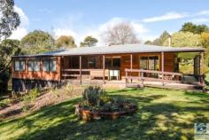  28 Rosengren Lane, STANLEY VIC 3747 PRIVATE AND PEACEFUL If it is space and tranquillity you are after, then this western red cedar home, situated on just over 2 acres in the centre of Stanley, may be just what you are looking for. This comfortable 3 bedroom home has a generous L-shaped lounge and dining area, with wood heating and reverse cycle wall air conditioning. The kitchen has a new stove with induction hotplates and electric oven. There is a large double door pantry to store all your groceries and produce. Last but not least, there is a freshly renovated bathroom. If it is extra space you are after then you will find a light-filled closed-in veranda room providing a multipurpose area either for guests, a study, or as a large rumpus room for the kids.  Outside there is an extensive orchard with approximately 50 fruit and nut trees. You will also find well thought out vegetable and herb beds, plus an assortment of native plants for the bird lovers. Water is not a problem with a 35,000 litre concrete tank (approx.) and an electric pump operated bore.  Double lock up shed or garage, plus additional smaller sheds, and a high clearance sub-floor area, provides you with plenty of storage space. Stanley was first settled in the 1850s during the gold rush era. Today it is only a five minute drive to the iconic Australian township of Beechworth, with its history steeped in gold. 