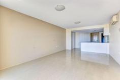  Unit 16/5 Whalley Street Bargara Qld 4670 Fourth floor two bedroom apartment with a sought after Northerly aspect, the ideal outlook to catch the Queensland winter sun. Views from the tiled balcony have a coastal aspect overlooking the township out to the ocean in the distance. The generous open living / dining area is tiled and air-conditioned. Adjoining is the attractive kitchen with Cesar Stone bench tops, ample cupboard storage, electric cooktop, under-bench stove, large refrigerator space, dishwasher and pantry / linen cupboard. The main sun filled bedroom has good views, carpet, is air-conditioned, there is a walk-in robe and en-suite bathroom Bedroom two has new carpet, is air-conditioned and has a built-in robe with mirrors. The main bathroom is very practical with bath, vanity and second toilet. There is a separate laundry. 