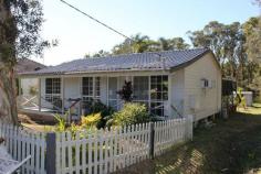 8 Kemira Road, Lake Munmorah, NSW Are you the DIY type, that has the skills to transform this original 
home into a contemporary residence and reap the financial rewards? If 
so, then look no further, as this property is in a very sought after 
location as it lies within a 5 minute walk to Woolworths a 5 minute 
drive to the sparkling foreshores of Lake Macquarie, local schools, 
national park and pristine beaches. 
 
556sqm block of land 
Backing natural bushland reserve 
3 Bedrooms 
Combined living and dining room 
Original timber kitchen 
Original bathroom 
Internal laundry 
Covered front verandah 
Rear deck (in need of repair or demolition) 
Projected rental return (post renovations) $320.00 to $350.00 per week 