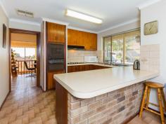  22 Ashley Dr Kelmscott WA 6111 This superb 5 bedroom, 2 bathroom, 3 wc’s home has everything you could want and more! Located high on the hill with city and 180 degree views from the extensive verandahs, you will feel like the King of the Castle!  This imposing split level brick and tile home will cater for the large or extended family very easily.  The home features a large formal entry with a sunken lounge with a view from every window, which opens out to the large wrap around verandah. There are two dining areas, one formal adjacent to the kitchen, the other is located next to the cosy family room with slow combustion heating. The kitchen is large with an abundance of cupboard space ideal to cook up a storm! The main bedroom is located off of the entry along with bedroom 2. The other 3 bedrooms, second bathroom and laundry are on the upper level in a separate wing. The huge games room with built in bar can be found downstairs next to the double garage.  The block is 877sqm with tiered gardens that lead up to the rear access. To top thing off there is a sparkling, cool fibreglass pool for the kids to enjoy!  A truly fantastic family home! Be quick! Property Map Map data ©2014 Google Terms of Use Report a map error Map Satellite Request Property Information If you would like more information on this property, simply complete the details below and we will be in contact shortly Name: Email: Mobile: Comments: Note: fields marked with a bold label are required to submit this form. Inspections Inspections by appointment only. Features General Features Property Type: House Bedrooms: 5 Bathrooms: 2 Land Size: 877 m² (approx) Indoor Toilets: 3 Rumpus Room Outdoor Garage Spaces: 2 Balcony Swimming Pool - Inground 