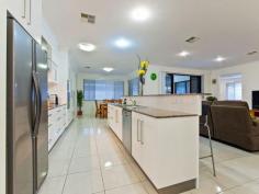 21 Amanda June Close Joyner QLD 4500 Inspections Inspections by appointment only. If
 you are searching for a very peaceful location and an ultra spacious 
home, consider all the options available to you with this wonderful 
property. The home was constructed in 2009 and designed to 
capture the Bay breezes and to reduce the summer heat. A stunning 
rendered façade leads to the formal entry with vaulted ceiling and wall 
niche for your prized photographs or artwork. You will notice the 
immediate feeling of space and light with the 9ft ceilings and large 
picture windows throughout this home. Do you have your wish list? You may enjoy ticking off the features: 5 spacious built in bedrooms; The master bedroom incorporates a large walk in robe; Fantastic
 ensuite with bath for relaxation, large separate shower, separate 
toilet and dual basins in the spacious, modern vanity; 3 distinct internal living areas comprising a formal lounge, family room and rumpus room; Separate dining adjacent to the kitchen will accommodate a larger dining setting; Centrally
 positioned white 2-pak designer kitchen with granite benches, triple 
pantry AND semi Butler's pantry, quality Bosch stainless steel 
appliances includes dishwasher and fan forced oven, ceramic cooktop and 
rangehood. Massive under roof outdoor alfresco with space for a large setting plus table tennis and occasional lounge chairs; 2 car, remote access garage with internal entry to the butler's pantry; 2 x 5000 litre water tanks Gas hot water; Ducted air-conditioned comfort; Ducted vacuum Security Alarm Wide
 side access to the huge fenced backyard where children and pets can run
 free - large enough for a weekend footy game or for a family cricket 
match; Pleasing landscaped gardens; Quiet cul-de-sac position; AND there is so much more for you to discover..... Just
 a 2 minutes drive to Genesis Christian College and to the Warner Shops.
 There are some lovely walking trails through a rainforest setting and 
along the river course right through to the AJ Willey bridge at Petrie. 
If you love produce markets, it's only are few minutes drive to the 
North Pine Country Markets. Come along and discover all that this stunning property offers. You and your family will be captivated! 