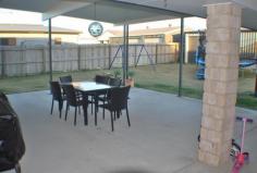  17 GOLDFINCH AVENUE Yeppoon Qld 4703 This as new 4 bedroom home has all the extras to keep the family happy. Open plan living, a massive outdoor party area, large securely fenced yard with ample side access and a big shed. So, the glossy living area tiles, the galley style kitchen and the modern colour scheme are the extras that would make you proud to be the owner of this beautiful family retreat. Close to town, shops and Schools. 