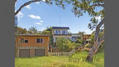  43-45 Sunrise Avenue Budgewoi NSW 2262 Waterfront - Two Titles Exciting opportunity for the prudent investor, those seeking all the benefits of a waterfront lifestyle or a combination of both in this substantial 3 bedroom home with ensuite, parents retreat and free-standing self-contained flat, ideal for in-law or teenage accommodation or a source of income. Rare double block on separate titles totalling 1,308 (approx) sq metres of high-set land with sweeping lake views, double garage, boat shed and easy access to lake front and just a stroll along the water's edge to community shops, popular Halekulani bowling club and ocean beach also handy. Waterfront land of this quality and size in one of the areas most popular streets is rare and at this price is virtually land value so phone for inspection today. General Features Property Type: House Bedrooms: 3 Bathrooms: 3 Land Size: 1308 m² (approx) Outdoor Features Garage Spaces: 3 
