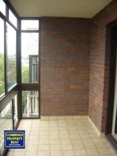  1/4 Rosemount Terrace Windsor Qld 4030 City views, great location, very stylish. Positioned on the second floor, the unit features 2 bedrooms with built in robes, stylish kitchen with stainless steel appliances and a dishwasher, great bathroom with internal laundry (washing machine and dryer are supplied) and an air-conditioned open plan living area that leads to an enclosed full length verandah - extending the already large living spaces. The property has a lock up garage and the building is secure, with intercom access at the ground level. Close to the RBH, CBD and transport. Sorry, no pets. 