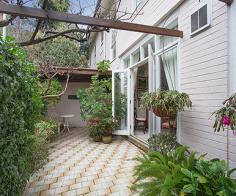  5/275 Edgecliff Rd Woollahra NSW 2025 A peaceful mews-like setting, sunny north aspect & generous proportions make this
	 townhouse a wonderful easycare home. Secluded from the road at the end of a private drive,
	 Kew Place is a boutique collection of 12 residences reminiscent of an English mews &
	 located between the chic attractions of Queen Street Village & the leafy tranquillity
	 of Cooper Park. The first time offered in over 30 years, it features a spacious dual
	 level layout with potential to create a fourth bedroom or study & is close to 
	Edgecliff station & Westfield Bondi Junction. 
 Whisper-quiet rear setting, private entry and wide foyer Bay fronted living room bathed in all day northerly sun Dining room opens to a wisteria-framed courtyard Modern granite kitchen, breakfast room or sitting room 3 large bedrooms with built-ins, fresh main bathroom Sun filled master bedroom with en-suite bathroom, walk-in robe sunny balcony & park views Enormous laundry room with scope to create a 4th bed Downstairs powder room, wine cellar, visitor parking Double garaging with mezzanine storage and internal access Generous indoor/outdoor living, scope to update 