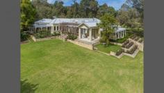 125 Connell Avenue, Martin, WA 6110 Sitting in the elevated alfresco area, listening to the sounds of silence, while watching the horses gently grazing down by the banks of the Canning River, you have this exquisite feeling that you are hundreds of kilometres from the hustle & bustle of the city. When the reality is you are only a short drive, maybe 35mins away. Sweeping manicured lawns bordered by handsome gardens greet you as your tires gently crunch the pebbled driveway on your way into Wisteria Park. Be engaged by the delightful sophistication of this expansive country style luxurious residence. 