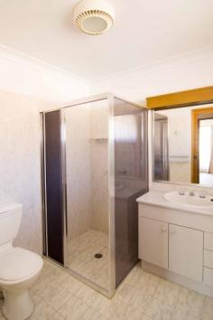  4/40 Wason Street Ulladulla NSW 2539 Location, Access & Views !! High on the rise overlooking Ulladulla Harbour, this two storey townhouse has an unbeatable location. It is a 2 minute stroll to Ulladulla's town centre, with its shops, banks, restaurants, cafes & boutiques, and the sea-pool is just round the corner. And yet, it is quiet and spacious, with thoughtful appointments & storage options. The living areas are generous, including an enclosed outdoor living space and courtyard. Recently re-carpeted, there is nothing to spend, just a lovely residence to enjoy. There is a single car garage with additional visitors parking. With excellent tenants in place, there are lots of options !!! Inspect today. General Features Property Type: Townhouse Bedrooms: 3 Bathrooms: 2 Building Size: 131.00 m² (14 squares) approx Indoor Features Ensuite: 1 Built-in Wardrobes Outdoor Features Garage Spaces: 1 Other Features Close to Schools, Close to Shops, Close to Transport, Heating, Water Views 