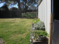  53 Grey St Glen Innes NSW 2370 This warm and cosy 3 bedroom weatherboard cottage is set amongst impressive, yet low maintenance gardens, relax and enjoy your gardens from the front timber deck or the sand stone paved back terrace. Located in a quiet area this home is only 2 blocks from the CBD. Cut your electricity cost down with a solar hot water system. Heated by either reverse cycle in the lounge, opening up to the bedrooms or a wood fire located in the practical eat in kitchen, with a walk through laundry that has a bonus 2nd shower. The generous fully fenced backyard has a garden shed, room for a vegie patch or chooks. Lock up garage with attached carport - an extra bonus   