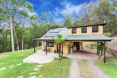  16 Byrne Road Bucketty NSW 2250 Bushland Dreaming! Set amidst a beautiful bushland setting looking down into a breathtaking valley with a scenic mountain backdrop beyond, this well built bush retreat would make the perfect weekender or permanent live in residence. The home has a very cosy feel and offers many unique features throughout. Lead light windows, cathedral ceilings and a 1.5kw solar system to name a few. Comprising 4 spacious bedrooms, loungeroom/living area with a warming slow combustion fire place, separate dining room, gourmet country style timber kitchen and a bush style bathroom with a cast iron claw foot bath. The home is quite spacious and is made up of downstairs living with a timber staircase leading the way up to an upstairs loft area where the master bedroom and 4th bedroom or optional office are located. A natural billabong style swimming pool is an eye catching focal point of the property. Set aside to an extensive timber pergola outdoor entertainment area which is surrounded by an amazing rock feature wall. Stunning water plants set the mood for this natural oasis and combine the great outdoors beautifully with the serenity of this awesome BBQ area. General Features Property Type: Lifestyle Bedrooms: 4 Bathrooms: 2 Land Size: 11.50ha (28.42 acres) (approx) Indoor Features Toilets: 2 Air Conditioning Outdoor Features Carport Spaces: 1 Swimming Pool - Inground 