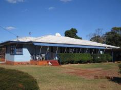 90 Merediths Road Gurgeena Qld 4626 5 Acres of Country Living - Binjour Enjoy country living at it's best in this spacious property * Massive family home surrounded by 5 acres of established trees * 3 bedrooms, 2 bathrooms plus an office * Oversized kitchen - ample cupboard space with servery to dining * Three living areas including sunken lounge * Approx 97000L rainwater storage * 3 bay shed with power & 2 bay carport off the home   Property Snapshot Property Type: House Land Area: 2 ha