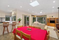  32 Wandarra Way Warranwood VIC 3134 4333Price Guide: More than $670,000   |  Land: 652 sqm approx 	   |  Type: House  |  ID #111891 Barry Plant Ringwood T 03 9870 5555 EMAIL OFFICE Nicole Freene T 03 9870 5555  |  M 0448 877 387 EMAIL AGENT Aaron Chuah T 03 9870 5555  |  M 0408 828 000 EMAIL AGENT Details Map/Directions Area profile   Carefully Designed To Offer The Ultimate Family Lifestyle From its quiet cul de sac location to the carefully planned two-storey floorplan, much thought has gone into creating this gem of a home that truly offers the ultimate family lifestyle. Careful consideration has gone into every aspect of this home to ensure its durability for everyday family living and ability to entertain on a very grand scale. It's therefore no surprise to note that large families are comfortably catered for within this space-laden home, which boasts three separate living areas along with a magnificent entertaining terrace that's virtually another room in itself! The home's grand persona is portrayed in the flowing sense of space shared by each of its radiant living areas, which maximise space and suited for a host of living requirements. Evoking the charm of a country lifestyle with its leafy surrounds and tranquil ambience, leadlight windows adorning the top of large, frameless windows are definitely in keeping with the home's period-inspired theme. Grand open-plan living with a large, well-appointed kitchen and family living with wood combustion fireplace makes for a superb centrepiece and combines with the spectacular wrap around deck that floats amongst the treetops, delivering the perfect indoor-outdoor entertaining set-up or peaceful sanctuary for that afternoon escape. While on the topic of peaceful sanctuaries, the light-filled formal lounge (with adjacent dining) frames pleasant front garden views as you unwind with a book in hand; teenagers, meanwhile, have a downstairs retreat to call their own. And with its own entrance, access to a large bedroom (with built-in robes) and brand new bathroom facilities on hand, it's also dressed with the flexibility of multi-generational living. Bedrooms of generous proportions delight with their comfort and space, while a huge amount of storage in and around the home promotes clutter-free living. Finished with gas ducted heating plus split-system heating and cooling and boasting a family-friendly location within excellent access of well-regarded private schools, scenic parkland, Eastland Shopping Centre and Eastlink 