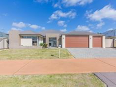  13 Kesiya Turn Aubin Grove WA 6164 FAMILY ENTERTAINER This 4 Bed 2 Bath Family Entertainer will suit the New Home Buyer and tick all the boxes of your requirements for your new Home. Close to School with easy Freeway access, New Medical Centre and the New Train Station coming soon. A Wide Driveway into the Triple remote Garage with neat reticulated Lawn and Garden beds at the front.  Enter the home through Frosted Glass Front Door, stepping into the Entry Hall/central passage with the Lounge Room open on the right. Timber Look Vinyl Planking Floors flow throughout the whole home except for Bathrooms and Laundry. The Master Bedroom is to the left front of the home and is an excellent size with twin WI'Robes either side of walkway through to the ensuite, featuring a large twin shower recess plus twin vanity's and separate WC. A Frosted Glass door from the Lounge opens through to the BIG Open Plan Living area; Kitchen/Dining/Family & Games. The Galley style Kitchen is immediately to the right and overlooks the whole area. This well equipped Kitchen is Modern and caters to all the housewife's needs with Stainless Steel Gas/Electric Cooking plus Range hood and Dishwasher, wide island Bench/Brekkie Bar, fantastic WI'Pantry and Double Fridge Space. A passage to the left of the Kitchen/Family rooms leads to the other 3 Bedrooms, all Double Size with Double Robes.  The Bathroom is centrally located between the bedrooms and includes a Glass Shower Recess, 4 door Vanity and an excellent deep bath. The well-appointed Laundry has a wide bench top with built in cupboards plus a WI'Linen Cupboard, a glass door allows access to the left side of the home Double glass doors open out from the Games Room to a fabulous Gabled Patio Entertainment Area, which can be Fully enclosed with Roll-down Shade Blinds.  Easy care reticulated lawn runs down the side of the Patio and across the full width of the back yard, A high Limestone wall at the rear makes the back yard and Entertainment area very private'.  If you also want a Pool, there is room for you to add a Lap Pool. Rear access is provided with a Manual Roller door through the Garage to the Patio Area. A pedestrian gate on the right of the Garage also allows access to the back yard. This could be your Dream Home' call Lorraine today for your private viewing appointment. 