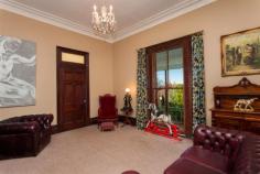  17 Hovell Street Goulburn NSW 2580 This gracious house, built at the turn of the century has had several lives, but has most recently been returned to the family home it always was.  It has six bedrooms and three bathrooms including a self-contained two bedroom unit. It is centrally located (the original frontage was to Auburn Street) but extremely private.  Access is via Hovell Street past the property’s original stables (now a separate home). The building has those structures which instantly set it apart from mere copies - 12 feet ceilings, floor length windows, bay window, bull-nosed verandahs and wide hallways, and retains period features such as cedar woodwork and marble fireplaces. The spacious eat-in kitchen is renovated, as are the three bathrooms – all echoing the style of the period.   All interiors have been stylishly decorated in keeping with the history of the home. 
