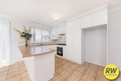  6/36 Sandover Circuit Amaroo ACT 2914 Set high on the hill in this quiet, leafy complex of only 14 quality 
townhouses, Tall Trees boasts a serene central 'park' featuring numerous
 mature eucalypts, lawns and plenty of room for picnics. Yet adjacent is
 access to the path taking you quickly to the lakeside reserve just a 
street away, where a leisurely stroll takes you to the quaint Yerrabi 
shops & restaurants. 
Located in the southeastern corner of the development, No 6 has no 
common walls with other properties, ensuring your quiet enjoyment in 
this beautifully presented home. This stunning home has been completely 
repainted plus the carpets have been replaced with new. Simply put there
 is not a cent to spend! There are two separate living areas, open plan 
family/kitchen/meals area which features some water views of Yerrabi 
Pond, large master bedroom with walk-in robe and ensuite, 2 other 
bedrooms with built-in robes, bathroom, laundry and separate toilet. 
Adjoining is a double lockup garage which has had part of one side 
converted into a craft room - this could be removed if desired. 
There is a weatherproof pergola adjacent to the laundry allowing 
all-weather clothes drying. Your year round comfort is assured with 
sunny north and east aspects, lovely large and private deck next to the 
covered verandah, plenty of yard space on all four sides, plus ducted 
gas heating for the cooler months. The property is well fenced and would
 be ideal for small pets and young children. EER 3.5 
Features: 
Two separate living areas 
Sunny east & north aspect 
Quiet location 
Fresh paint throughout 
New carpet 
Double garage or single with craft room 
Large garden shed 
Open plan kitchen/family/meals area 
900mm gas cooktop 
Bathrooms tiled to the ceiling 
Built in robes to all 3 bedrooms 
Body Corporate $480/qtr 
Potential rent $450/wk 