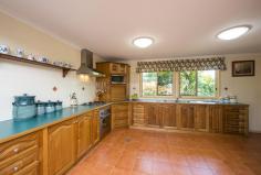  51 Ironmonger Street Calliope Qld 4680  Price 	 Price Guide $600,000 - $650,000 Suburb 	 Calliope Postcode 	 4680 Property Type 	 Acreage/Semi-Rural Bedrooms 	 3.5 Bathrooms 	 1.5 Carspaces 	 9 Land Size 	 5 Acres YOUR OWN SANCTUARY ON TOWN DOORSTEP! Superb small acreage on the door step of town. With this package you can have it all! Literally 3 minutes to Calliope, the kids could walk to school.  5 acres of useable land, gorgeous views, spacious home and great sheds. This home has not seen to the market for over 30 years. The current owners have loved the lifestyle and maintained the property the beautifully over this period. Surrounded by glorious easy care gardens privacy is assured.  A completely transformation took place 14 years ago to bring the home to its current standard. Entertaining options are plentiful with rural or mountain views from every corner. Inside the house has been design to capture these for nearly every room. The chef is the home with love the amazing Black Wattle kitchen with gas cook top and electric oven, range hood and loads of storage and bench space. Tiled open living space beautifully appointed. Massive laundry with storage that anyone would be envious of and then there is the linen cupboard.  BIG bedrooms all are built-in and have sliding doors to access outside, giving great ventilation. Huge bathroom with floor to ceiling tiling, separate bath and shower and corner to corner vanity.  Two 3 bay sheds both with power. 1 with 2 automatic roller door, new paint and there is even a toilet! The man around the home will be in his element. Add 100+ Mangoes, full fencing, town water and bore. Seeing is believing here.  