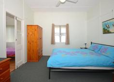  11 Burrum Street, BURRUM HEADS QLD 4659 Situated in Burrum Street within walking distance to Ross St boat ramp, lions park and shops. Highset queenslander in great condition. Recently has been re-roofed, fresh internal paint and new floor coverings. Central lounge and kitchen/ding area. There is two bedrooms with sleepout. Bathroom with shower and toilet cottage, underneath is car accommodation or storage and laundry facilities. The allotment is a high profile 1012m2 (1/4 acre) and has a fenced section for pets. There is a steel framed double garage with easy side access from the street. Happy Days has been a popular holiday rental home for many years, and is the ideal beach side holiday cottage. This position in town offers an excellent opportunity with a fantastic future. Furniture Package can be included by negotiation. 