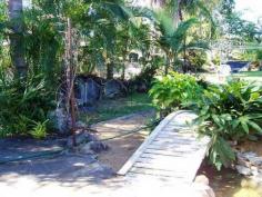  18 Kent St Bororen QLD 4678 This cosy timber Queenslander home is situated close to the local Bororen School and is within a short stroll to the shops. Stepping up 4 steps you are greeted in an enclosed sunroom that offers great extra living space. Down the hallway it opens up into the living and dining area that features an combustion heater. The kitchen is tucked away just off from the living and dining area and offers timber bench tops, free standing oven, breakfast bar window. Two large bedrooms with built in robes and one fitted with air conditioning. Extra bedrooms have been made to suit your family. Vibrant large bathroom provides bath, separate shower & ample storage space. Outside features a huge undercover entertainment area that flows seamlessly into the backyard. Above ground pool and rock fire BBQ is great for those hot summer days shared with friends and family. Tranquil pond with small bridge leaping over it, adds that extra special touch! Side access with extra shed space at the rear and single carport tops it off. Easy access to the Highway and a 25 minute drive to Tannum Sands. 