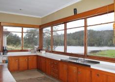  5090 Huon Highway Geeveston TAS 7116 Great Value With Priceless Views The renovations have just begun and this fantastic home is now available for you to make your mark. This wonderful home is situated on nearly 2 hectares of lush pastureland with views that will calm even the most highly strung and stressed person. From the oversized kitchen/dining area, you can simply sit and take in the tranquil water and mountain views. Or take a leisurely walk across the green pastures beside the dam, and just take in the serenity. The house features 4 double sized bedrooms, central lounge area and a large open plan kitchen and dining area. Recent renovations have revealed beautiful timber floors that are ready to be brought back to their former glory. The high ceilings create an added sense of space and light. There is a separate rumpus/sleepout that comes with its own pool table, great as a teenagers retreat or workshop for your latest hobby. With a little bit of work, you will have a magnificent home. 