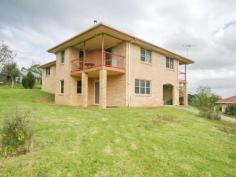 78 Windabout Road Beechmont  Qld 4211 BIG HOUSE AND BIG SEPARATE FLAT ON ACREAGE There is plenty of room for the large family in this expansive nine year old home .Quality built throughout with beautiful honey coloured hardwood flooring and big tassie oak kitchen with huge walk in pantry.. If you have an extended family needing accommodation the two bedroom detached 'flat' is the size of of a small home and conveniently located 20 metres from the main house.this could also provide a substantial additional income if separately let. the property is well elevated with lovely views into the hills. The block is almost level and the red volcanic soil will grow anything. An ideal rural retreat just 30 minutes to Nerang. General Features Property Type:House Bedrooms:4 Bathrooms:2 Indoor Features Ensuite:1 Living Areas:2 Toilets:3 Study Floorboards Broadband Internet Available Built-in Wardrobes Dishwasher Open Fireplace Outdoor Features Garage Spaces:2 Open Car Spaces:6 Balcony Eco Friendly Features Solar Panels Solar Hot Water Water Tank Greywater System 