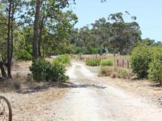  11 Caponi Rd Barragup WA 6209 Drive up the picturesque drive of the fully fenced property towards the 
old Fibro home, set only metres from the river. This 4.96ha sub 
dividable rural block can be split into two. You can keep one and sell 
the other. Power and scheme water are connected to the property. Build
 your dream home away from it all but only minutes from Mandurah's 
Coffee Strip, Shops, Schools, Transport, Spud Shed & Freeway. Call Ian Lay today 0407 479 747 to arrange your viewing.
 