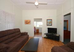  11 Burrum Street, BURRUM HEADS QLD 4659 Situated in Burrum Street within walking distance to Ross St boat ramp, lions park and shops. Highset queenslander in great condition. Recently has been re-roofed, fresh internal paint and new floor coverings. Central lounge and kitchen/ding area. There is two bedrooms with sleepout. Bathroom with shower and toilet cottage, underneath is car accommodation or storage and laundry facilities. The allotment is a high profile 1012m2 (1/4 acre) and has a fenced section for pets. There is a steel framed double garage with easy side access from the street. Happy Days has been a popular holiday rental home for many years, and is the ideal beach side holiday cottage. This position in town offers an excellent opportunity with a fantastic future. Furniture Package can be included by negotiation. 
