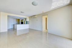  Unit 16/5 Whalley Street Bargara Qld 4670 Fourth floor two bedroom apartment with a sought after Northerly aspect, the ideal outlook to catch the Queensland winter sun. Views from the tiled balcony have a coastal aspect overlooking the township out to the ocean in the distance. The generous open living / dining area is tiled and air-conditioned. Adjoining is the attractive kitchen with Cesar Stone bench tops, ample cupboard storage, electric cooktop, under-bench stove, large refrigerator space, dishwasher and pantry / linen cupboard. The main sun filled bedroom has good views, carpet, is air-conditioned, there is a walk-in robe and en-suite bathroom Bedroom two has new carpet, is air-conditioned and has a built-in robe with mirrors. The main bathroom is very practical with bath, vanity and second toilet. There is a separate laundry. 