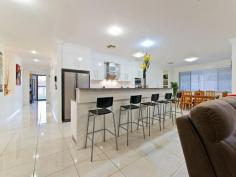 21 Amanda June Close Joyner QLD 4500 Inspections Inspections by appointment only. If
 you are searching for a very peaceful location and an ultra spacious 
home, consider all the options available to you with this wonderful 
property. The home was constructed in 2009 and designed to 
capture the Bay breezes and to reduce the summer heat. A stunning 
rendered façade leads to the formal entry with vaulted ceiling and wall 
niche for your prized photographs or artwork. You will notice the 
immediate feeling of space and light with the 9ft ceilings and large 
picture windows throughout this home. Do you have your wish list? You may enjoy ticking off the features: 5 spacious built in bedrooms; The master bedroom incorporates a large walk in robe; Fantastic
 ensuite with bath for relaxation, large separate shower, separate 
toilet and dual basins in the spacious, modern vanity; 3 distinct internal living areas comprising a formal lounge, family room and rumpus room; Separate dining adjacent to the kitchen will accommodate a larger dining setting; Centrally
 positioned white 2-pak designer kitchen with granite benches, triple 
pantry AND semi Butler's pantry, quality Bosch stainless steel 
appliances includes dishwasher and fan forced oven, ceramic cooktop and 
rangehood. Massive under roof outdoor alfresco with space for a large setting plus table tennis and occasional lounge chairs; 2 car, remote access garage with internal entry to the butler's pantry; 2 x 5000 litre water tanks Gas hot water; Ducted air-conditioned comfort; Ducted vacuum Security Alarm Wide
 side access to the huge fenced backyard where children and pets can run
 free - large enough for a weekend footy game or for a family cricket 
match; Pleasing landscaped gardens; Quiet cul-de-sac position; AND there is so much more for you to discover..... Just
 a 2 minutes drive to Genesis Christian College and to the Warner Shops.
 There are some lovely walking trails through a rainforest setting and 
along the river course right through to the AJ Willey bridge at Petrie. 
If you love produce markets, it's only are few minutes drive to the 
North Pine Country Markets. Come along and discover all that this stunning property offers. You and your family will be captivated! 