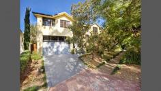  17 Tonkies Pl Menai NSW 2234 A HAVEN OF STYLE & TRANQUILITY Unique in its design, this architectural full-brick masterpiece is set at the end of a quiet and picturesque cul-de-sac whilst just being a short walk to schools, restaurants, transport and the Menai Marketplace. Enjoying a leafy outlook from every room, this stunning residence offers; - Four well proportioned bedrooms (all with built-in-robes) - Master bedroom retreat incorporates a walk-in-robe and ensuite - Light and airy bathroom with large corner bath and separate shower - Mammoth sized kitchen with granite bench top and quality appliances - Separate rumpus with high vaulted ceilings - perfect teenage retreat - Large sitting room and casual dining area flows seamlessly to the alfresco entertaining deck - Separate large dining room (could also be used as home office or downstairs bedroom) - Feature timber flooring and ducted air conditioning for year round enjoyment - Stunning salt water in-ground pool with solar heating for your enjoyment! - Double lock-up garage with internal access and ample storage space 