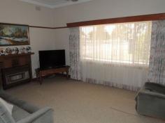  16 Yana St Swan Hill VIC 3585 Very comfortable home set on 1 & 1/4 Acres of lovely treed garden setting with plenty of shedding for an enthusiast. 
 
Three bedroom, vinyl clad home features lounge, gas heating, ducted 
cooling, eat in kitchen, breezeway and renovated bathroom. A large 
steel framed outdoor area is a great spot to enjoy the treed garden 
views. The three car, steel framed, concreted floored carport is 
adjacent to the bigger than double garage. 
 
Set well down on the block is a four bay garage, powered and ideal for 
boat caravan and workshop. A rotunda is amongst the trees and many 
happy barbeques would be enjoyed by the family. The property has a 
3.1MGL water allocation to keep the massive gardens green. Make no 
mistake this is a terrific, affordable lifestyle property, situated in 
Swan Hill. 
 
   
 
 Property Snapshot 
 
 
 
 Property Type: 
 Small Acreage 
 
 
 Construction: 
 Vinyl Cladding 
 
 
 House Size: 
 135.00 m 2 
 
 
 Land Area: 
 5,061 m 2 
 
 
 Features: 
 
 Built-In-Robes 
 Ducted Cooling 
 Established Gardens 
 Gas 
 Lounge 
 Pergola 
