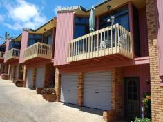  4/4 Vernon Street Scotts Head NSW 2447 Quality Property and Lifestyle Investment - price now $305,000. Whether you are looking for a great property investment, holiday getaway or sea change - this property is for you. This is a low maintenance property for no fuss beach living or rental.  It's recently renovated with new kitchen, bathrooms, bamboo floors, new carpet in bedrooms and freshly painted. Key property features include: - Split level living - 3 bedroom and 2 bathrooms - Modern kitchen - Lots of storage and built-ins - Aluminium sliding doors and windows, fly screens and vertical blinds - Nice high ceilings with plenty of room - 2 verandahs, one with ocean views plus outdoor courtyard/garden - Separate laundry - Double lock up garage with inside access - Plus visitors parking and communal garden General Features Property Type: Townhouse Bedrooms: 3 Bathrooms: 2 Indoor Features Living Areas: 1 Toilets: 2 Floorboards Broadband Internet Available Built-in Wardrobes Pay TV Access Outdoor Features Remote Garage Secure Parking Garage Spaces: 2 Open Car Spaces: 2 Balcony Courtyard Outdoor Entertaining Area Fully Fenced Other Features Strata fees, rates and holiday rental fees available on request. 
