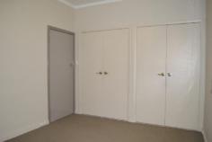  UNIT 6/25 HANNAN STREET KALGOORLIE WA 6430 THE CITY ON YOUR DOORSTEP This conveniently located unit is situated on the top floor of the apartment block with views of the bustling lifestyle that is Hannan Street, Kalgoorlie. The modern two bedroom unit features good size bedrooms both with built in robes, modern bathroom with vanity, shower and separate toilet. The open plan living, dining and kitchen area is contemporary with floating wooden floorboards, large windows and the comfort of reverse cycle air-conditioning. The kitchen features electric cooking, dishwasher and pantry with a swiss laundry located...  2 Bedrooms with BIR 1 Bathroom with separate toilet Open plan living, dining and kitchen Electric cooking and HWS Swiss laundry Single carport and storage room Communal decked patio with BBQ Complex of 8 