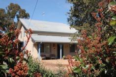 Katamatite VIC 3649 Situated on approx 1 acre of land and nestled amongst a wonderful array 
of established trees and gardens, this home is looking for a new family.
 Offering 3 good size bedrooms, 3 living areas, renovated bathroom, a 
country style kitchen, heating and cooling, large shedding with 3 
stables and Town water supplied to the property. A wonderful property 
and a must to inspect. 
