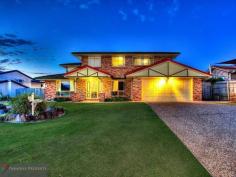  Parkinson Qld 4115 BIG HOME IN THE HEART OF LAKEWOOD
This home has everything you need: BIG BLOCK, BIG SHED, SIDE ACCESS, HEATED POOL, BALI HUT, 5 BED, 3 BATH + 4 CAR.

Set on a massive 890m2 block, this big 39 square home stands out from the rest and radiates a charm that will stir your curiosity.

With plenty of separate living areas for the growing family – there is a blend of both formal and informal living that ensures there is space for everyone.

Beautiful bi-fold lead-light doors showcase the formal living and dining areas and provide the perfect backdrop to host formal dinner parties. 

The heartbeat of the house is the big Tassie Oak kitchen – with heaps of bench and cupboard space and servery to outdoor entertaining.

Adjoining the kitchen is the casual meals area that leads into a massive air-conditioned rumpus with imposing raked ceiling. This room would make the ideal games room or home cinema.

The downstairs 5th bedroom/study has a walk-in robe for extra storage and is perfect for a home-based business or spare bedroom for guests or extended family staying over, as there is a full bathroom with shower downstairs too.

Quality bamboo floor coverings extend up the stairway and feature throughout the 4 bedrooms upstairs.

Each bedroom has built-in robes and the big air-conditioned master bedroom features a huge walk-in robe/dressing room and en-suite.

Also the spacious main bathroom has a spa bath for an added touch of luxury.

Enjoy resort style living in the big back yard – complete with an expansive raked patio overlooking the heated in-ground pool and tropical Bali hut surrounded by fragrant frangipanis. It’s a great place to enjoy outdoor entertaining with family and friends all year round.

As a special treat for the home-handyman or creative craftsman, there’s a massive 2-bay workshed. It’s powered, lined and insulated – the perfect man cave any man could want! It also doubles as extra car parking and offers secure storage for your hobby car, boat, caravan or trailer and there’s great side access too.

The huge 10,000 litre water tank provides plenty of water to keep your garden looking great and the pool topped up all-year round.

This fantastic property is close to schools, shops and city-express bus, and with the beautiful Lakewood park reserve, playgrounds and walking tracks only a short stroll away, there’s no better place to be.

So, if it’s time to step up into the home you’ve always wanted, then this is the home and the time is now!

Inspection by appointment only. 