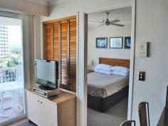  210 Surf Parade SURFERS PARADISE Qld 4217 AFFORDABLE & SPACIOUS and CLOSE to the NEW LIGHT RAIL  * One Bedroom One Bathroom Unit  * Floor Size Approx 55M2  * One Floor from the Top Level  * Brand New Carpet  * B/Corp $103 per week  * Council Rates $2488 per annum  * Sinking Fund Healthy Approx $500,000  * Holiday Letting Income Approx $25,000 per annum  ' Surf Parade Resort ' is a Boutique Building , of 9 Levels , exquisitely maintained to an extremely high standard .. Amazing Tropical Gardens lead to Heated Pool , Spa , Tennis Court , Gym , BBQ Lounge , Sauna whilst situated close to the Beach and Broadbeach.. Expansive views of the Hinterland and the Ocean . Five Star Resort Facilities , Immaculate Throughout ...First to see will buy . 