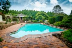  40 Tyringham Road Dorrigo NSW 2453 Your Very Own Piece Of Paradise Drive in the driveway and be blown away by this incredible home, it truly is breath taking from the lovely gardens to the picturesque pool and beautiful views. As you would expect, the home itself will NOT disappoint with 3 good sized bedrooms, 2 with built inns, recently renovated bathroom and kitchen and gorgeous hard to come by brick fire place perfect for those winter nights. If entertaining is for you well look no further, with a HUGE undercover entertaining area at the rear conveniently located close to the kitchen and swimming pool this property truly is an entertainers delight. And if that's not enough to have you booking the removalist, here are a few more points to remember, but really with a property like this no words can describe its beauty. So don't miss out, book your private inspection today. - 2166m2 parcel of perfection - Wooden floors  - Gas hot water - Ceiling fans - New pool pump - Extra room separately enclosed at the rear of the SLUG with plenty of potential - 2 toilets  - Larger than average pantry - Good sized work shop and 4 car garage separate to the house (with power) - Plus much, much more  General Features Property Type: House Bedrooms: 3 Bathrooms: 1 Land Size: 2166 m² (approx) Outdoor Features Carport Spaces: 1 Garage Spaces: 5 Courtyard Other Features Dining Room, Outdoor Living, Pool 