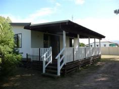  63 Plantation Avenue Brandon  Qld 4808 Covering 2.04 hectares & situated 30 minutes from Ayr and Townsville is this neat low set 2 bedroom home at Horseshoe Lagoon. This rural property is minutes from one of Sucrogen's largest Sugar Mills with endless possibilities, grow your own vegies, run a horse or ride a four wheeler.  - 2 Bedrooms, 1 with air-conditioning - Full length front deck  - Open living area carpeted + air-conditioning - Good laminated kitchen with electric stove & pantry - Bath & shower combined - All weather back entertaining area - Water tanks, pump & bore - Partly fenced - Lockable container Make the lifestyle change today. - See more at: http://www.landmarkharcourts.com.au/Property/582864/LTY2958/63-Plantation-Avenue#sthash.5HWih5Ui.dpuf 