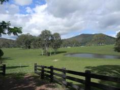 3568 Maleny Kenilworth Road, Kenilworth, Qld 4574 Just under 50 acres with full frontage to the Mary River.
 Situated less than 2kms from town with bitumen road frontage.
 Beautiful block with fantastic soil, rolling kikuyu pasture and an 
excellent water supply from two good sized dams and the river.
 No major flooding issues with this property.
 Excellent house sites that offer very good views over the block and nearby rural acreage/farming land.
 Cows and calves included if you wish. 