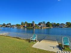 32 Marina View Parade St Huberts Island NSW 2257 Sandy Beach Waterfront Waterfront fun in the sun is on offer here. Such a delightful location, this waterfront home takes advantage of the sunny aspect from the level 669m2 block which features a sparkling pool. The solid home is in great original condition, and perfect for those wanting to put their own energy, taste & style into the dream home. St Huberts Island is idyllic location 10 minutes from the Woy Woy Rail link, 15minutes from the M1 (formally known as the F3), Avoca & Terrigal Beaches & Erina Shopping Center. A great lifestyle is on offer here, call us now 4344 10