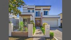 9 Menton Avenue, Varsity Lakes, QLD Come and experience the magic of Azzurra Island Varsity Lakes with its 
quiet streets and stunning park areas and see this wonderful large 
family home, which is as fresh as the day it was finished. It takes the 
concept of hassle free living in the suburbs to a whole new level. If 
you can find a lifestyle easier to enjoy than this we'd be very 
surprised. Within walking distance to Varsity College junior and senior 
school, shops and major transport route buses, this feature packed 
modern home is one you don't want to miss. Four living areas including 
mezzanine floor lounge, just beside a massive master bedroom means you 
can enjoy complete privacy. Great indoor - outdoor flow means you can 
entertain in style or to have a few friends over for a barbecue beside 
the pool. It will open your eyes as to how easy life can be and you will
 simply not want to leave. 4 bedrooms 3 Bathrooms Double Lock up Garage Fully landscaped in ground Pool Al fresco entertainment area Formal Dining area Gourmet Kitchen with Stone Benches Ducted Air Conditioning Security system Solar hot water 400sqm low maintenance Block 