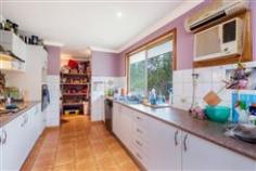  24 Donald Dr Curra QLD 4570 In a quiet bush land setting, but still only a short drive to the highway and local shop's, is this solid two story family home on five private well treed acres. - Double car lock up garage under house, also second toilet and shower. - On the roof is 4.2 K W worth of solar panels. - Plenty of room for dog's chook's etc., two dams for your garden and or vegie patch, fire fighter on big dam, connected to taps in yard. - One 6x4 garden shed standing, two more mostly assembled, one 6x4 one 6x9 - Ready to put where you want them and an old chook pen ready to go [with a little T L C].  - Four large bedroom's, all with built in's and air-conditioning - Kitchen is galley style with a walk in pantry at the end, double sink, dishwasher separate stove and cook top. - Partly open plan kitchen dinning into lounge room. All in all a good solid liveable family home. - See more at: http://www.landmarkharcourts.com.au/Property/582937/QGM8399/24-Donald-Drive#sthash.CG3k5U08.dpuf 