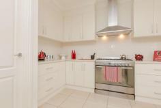  29 Derna Road   Robinvale   Vic   3549 Not only are there heaps of rooms but they're all much larger than average. Set on approx. 1 acre is this 4 year old 50.4 sqm UMR home. 3 large bedrooms - BIR plus Master with over sized ensuite. Kitchen features chef's stove, huge WI pantry & loads of bench space. The open dining & family area overlook the grassed fully fenced yard. Formal entry & Sep lounge room, also a TV room/study. Sweeping verandas, 3 phase ducted R/C air con, Dbl garage with extra toilet. Space for a vegie garden under watering system. Water storage is no problem with 2 x 23,000lt tanks to cater for your 3 Megs & rain water. The entertainment area comes complete with BI brick fireplace. To complete this package is the man shed approx 7.5 x 12m, concrete floor, kitchenette, 3 phase power. A real man's cave!. You will find all this & so much more on this property. Only minutes from Robinvale. An inspection will impress. 