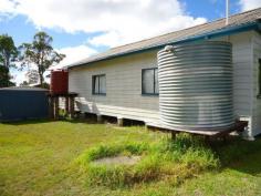  6 Haig Street The Summit QLD 4377 Surplus to the needs of the Queensland CWA is The Summit hall. Property consists of a cladded hall set on mostly concrete stumps, with approximately 100m2 floor space, kitchen, toilet and washroom and the hall is heated by a reverse cycle air conditioning system. Solid hardwood building, 2 rainwater tanks, set on a 1,212m2 allotment, partially fenced, lawn locker and septic sewer system. Hall is accessible by concrete ramps to the front and back of the hall with modern aluminium and glass doors at the front entrance. Can be converted into residence with correct approvals from council. 