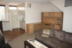  57/111 Bloomfield St Gillen NT 0870 This unit is located in the Gap Estate which is approx. 3.2kms from the town center. The complex itself has a large swimming pool to relax during the warm summer days. The two bedroom townhouse is neatly presented with open plan living area downstairs and split system air conditioning. All furniture is in good condition and includes couch, study desk, white goods and bed. Upstairs there are two bedrooms with built-ins and split system air conditioning. The second bedroom has a balcony with views of the ranges. The bathroom has shower, toilet and vanity. Downstairs you have a private courtyard that is beautifully designed with paving, artificial grass and a garden bed. A great place to have BBQ while you enjoy the views of the ranges. Undercover parking out the front and only side neighbours is very appealing. 