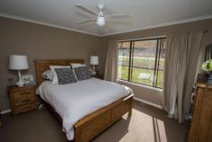  6 Tongbong Rd Rylstone NSW 2849 Renovated with French country style, this four bedroom home is situated on a gently sloping one acre block on the the banks of the Cudgegong River. Sit on your rear deck and see if you can spot the platypus bobbing about in the river below, or feast your eyes on the panoramic view of the Rylstone township with it's picture perfect charm. The home comprises a generous lounge room that flows into a charming eat in kitchen with ample pantry and bench space. The four bedrooms are well sized and have built in robes. The modern bathroom has separate bath and shower.  The entire home is flooded with natural light and is kept cosy with an extremely efficient wood heater, and cooled with air conditioning in summer. A covered outdoor entertaining area is protected from the elements with cafe blinds when needed, and there's plenty of storage for cars and toys in the double lock up garage and garden shed. 
