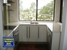  1/4 Rosemount Terrace Windsor Qld 4030 City views, great location, very stylish. Positioned on the second floor, the unit features 2 bedrooms with built in robes, stylish kitchen with stainless steel appliances and a dishwasher, great bathroom with internal laundry (washing machine and dryer are supplied) and an air-conditioned open plan living area that leads to an enclosed full length verandah - extending the already large living spaces. The property has a lock up garage and the building is secure, with intercom access at the ground level. Close to the RBH, CBD and transport. Sorry, no pets. 