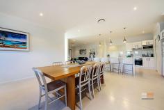  38 Coachmans Close Sapphire Beach NSW 2450 Embracing an elevated outlook towards Hills Beach and incorporating two 
levels, this 2 1/2 year old masterpiece awaits your inspection. 
Designed to take advantage of the location, the home features five 
bedrooms, two living areas and two outdoor undercover entertaining areas
 including an elevated deck. The fifth bedroom could also be used as a 
third living area or rumpus and enjoys its own bathroom. A designer 
kitchen with stainless appliances and stone benches is the centerpiece 
of the home. High ceilings and a modern decor add to the appeal as does
 the reverse cycle ducted air conditioning. A home not to be missed in a
 popular location north of Coffs Harbour. 
Rates: $2,742pa (approx) - Land size: 601sqm (approx) 