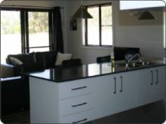  9 Waratah Close Gunnedah NSW 2380 Why go through the hassle of building when its already done… Featuring good design and clean modern lines this home is only 12 months old and offers 4 bedrooms with ensuite & WIR to main bedroom, built ins to other bedrooms & the main bathroom has a seperate toilet. The kitchen, dining and family area are open plan & the kitchen is stylish & practical with dishwasher & large walk in pantry. In addition there is a home theatre, storage room as well as linen storage, and the comfort of ducted reverse cycle A/C. Remote Double garage, large 1017sq m block with great backyard access on both sides of the house and plenty of space for parking a van, boat or both. Alternatively there is the option of adding a shed or pool (subject to council approval). Owners are relocating and the property is for genuine sale. Inspection by appointment only. DISCLAIMER; "The above information has been supplied to us by the Vendor. We do not accept responsibility to any person for its accuracy and do no more than pass this information on. Interested parties should make and rely upon their own enquiries in order to determine whether or not this information is in fact accurate."  