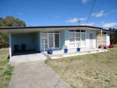  49 Bridge Street Stanthorpe Qld 4380 Very comfortable 2 bedroom chamferboard home with separate sun room or study. Located only a short walk to creek, parks, CBD and restaurants while close to hospital and aged care facilities. Spacious kitchen and dining room, separate lounge room with wood heater, large laundry with plenty of storage space and an open front verandah with a Northerly aspect perfectly positioned to capture the winter sun. Set on a 905m2 allotment with fenced back yard, rainwater tank and a single carport. Tidy, solid home in a convenient location. 