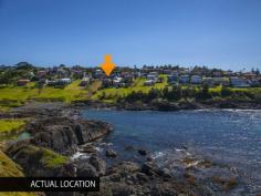  20 Elanora Road Kiama Heights NSW 2533 Ocean Front Indulgence! Being offered for sale for the first time in 25 years is this sophisticated property positioned overlooking the stunning Kiama Heights Bay! This large home is deceiving from the front, but as you walk in the entry level there are 3 large bedrooms spread out all with BIWs, a large bathroom with separate spa and also a separate toilet.  As you travel up one level you are welcome by the stunning view of your balcony overlooking the waves crashing on the rocks of the Bay and the picturesque view of the livestock roaming around the headlands. Sit back and relax in the large living area with bar area as you watch the dolphins and whales pass by below! On the lower level you are lucky enough to be able to stand in the large gourmet kitchen and prepare a meal whilst once again being able to enjoy the expansive view from the large bay window. This level also offers a generous sized sitting and dining area with access to a full balcony to enjoy the beautiful sea view. From this lower level you can access the contained main bedroom suite with WIR and ensuite, plus access to another balcony again taking in this stunning view! General Features Property Type: House Bedrooms: 5 Bathrooms: 3 Indoor Features Ensuite: 1 Outdoor Features Garage Spaces: 2 Open Car Spaces: 1 